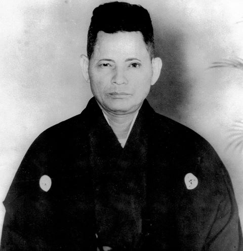 Tatsuo Shimabuku, founder of Isshinryu karate, in a formal black kimono